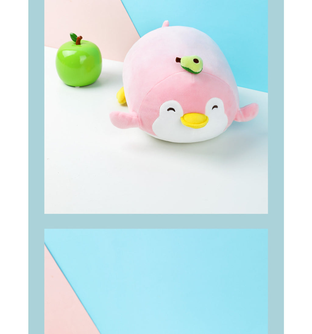 Liegender Pinguin als Plüschtier (Avocado)